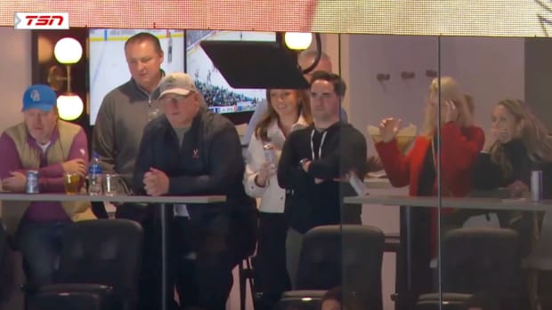 Brady Tkachuk’s family watches as he fights an opponent